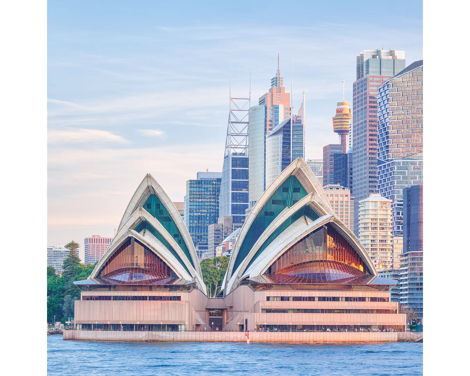 Sydney Opera House and Sydney CBD at sunset.