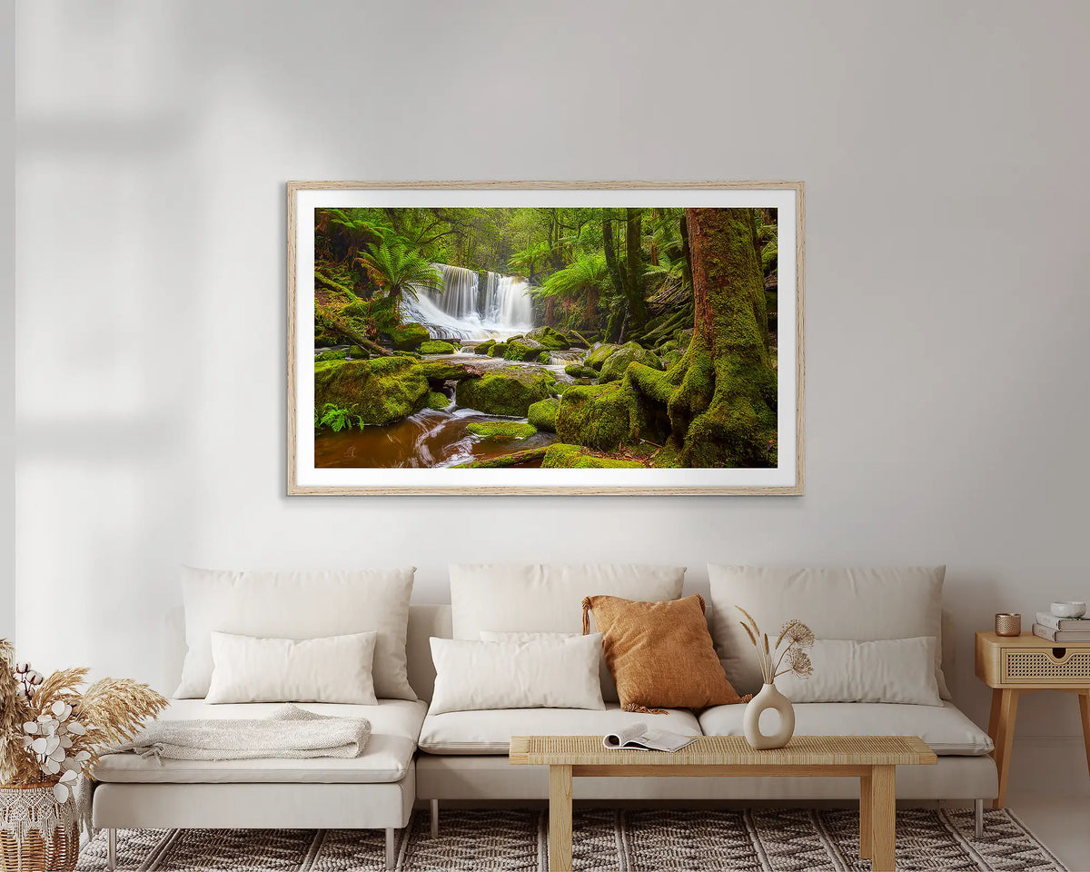 Tasmanian Escape. Horseshoe Falls, Tasmania wall art print, with a timber frame, on a lounge room wall.  