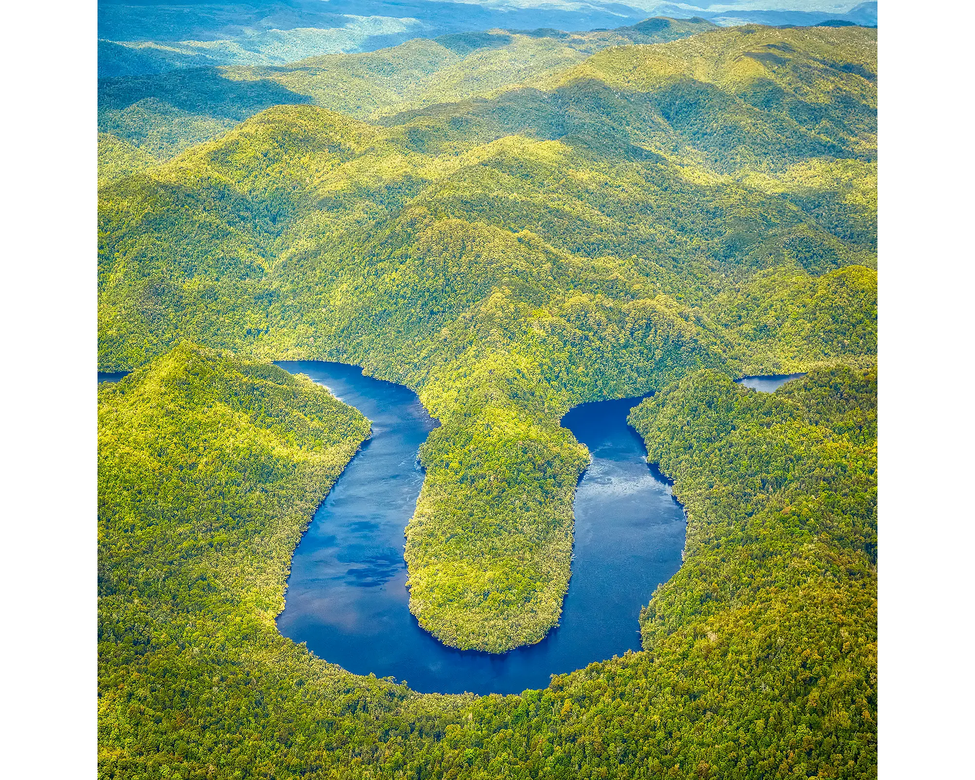 The Bend acrylic block - Gordon river winding through lush green forest.