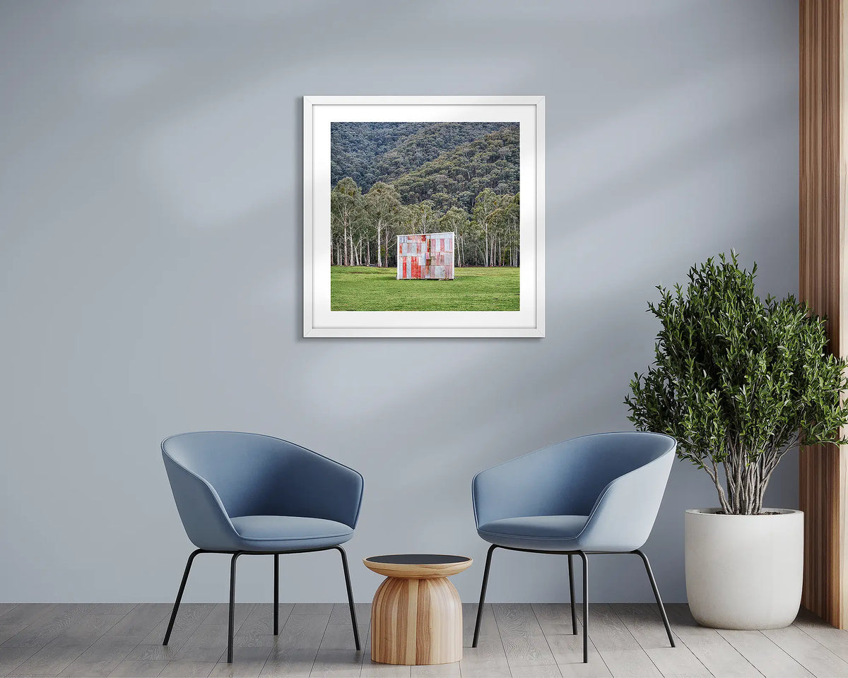 The Box. Farm shed wall art print with a white frame, in a sitting room. 