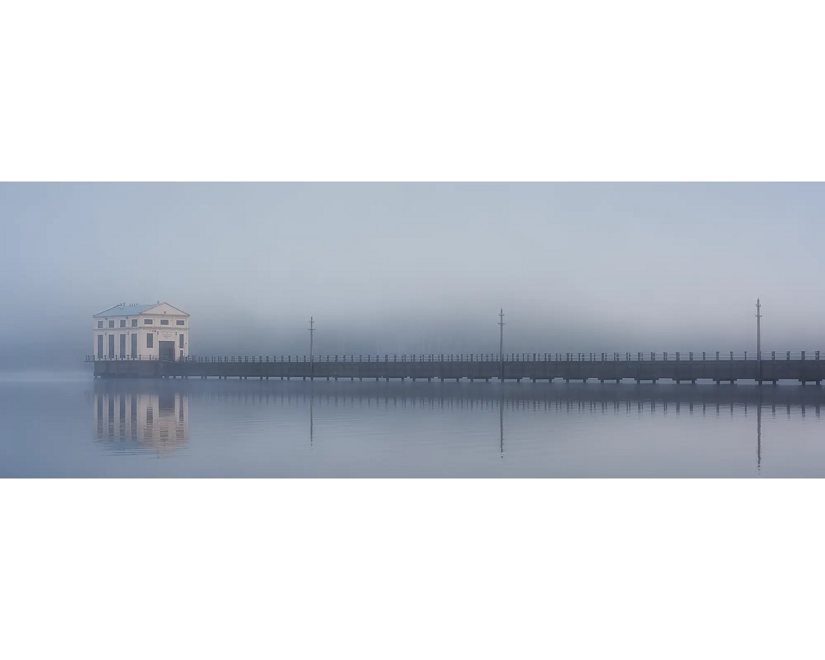 The pumphouse at Lake St Clair shrouded in fog, Tasmania. 