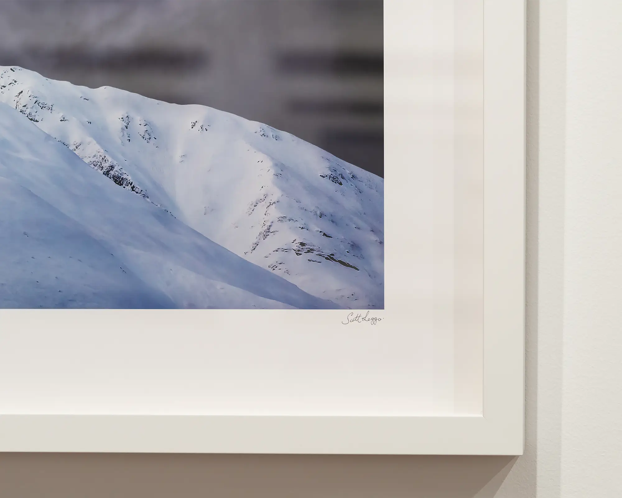 The Summit. Mount Feathertop with snow and dark clouds, Alpine National Park, Victoria, Australia.