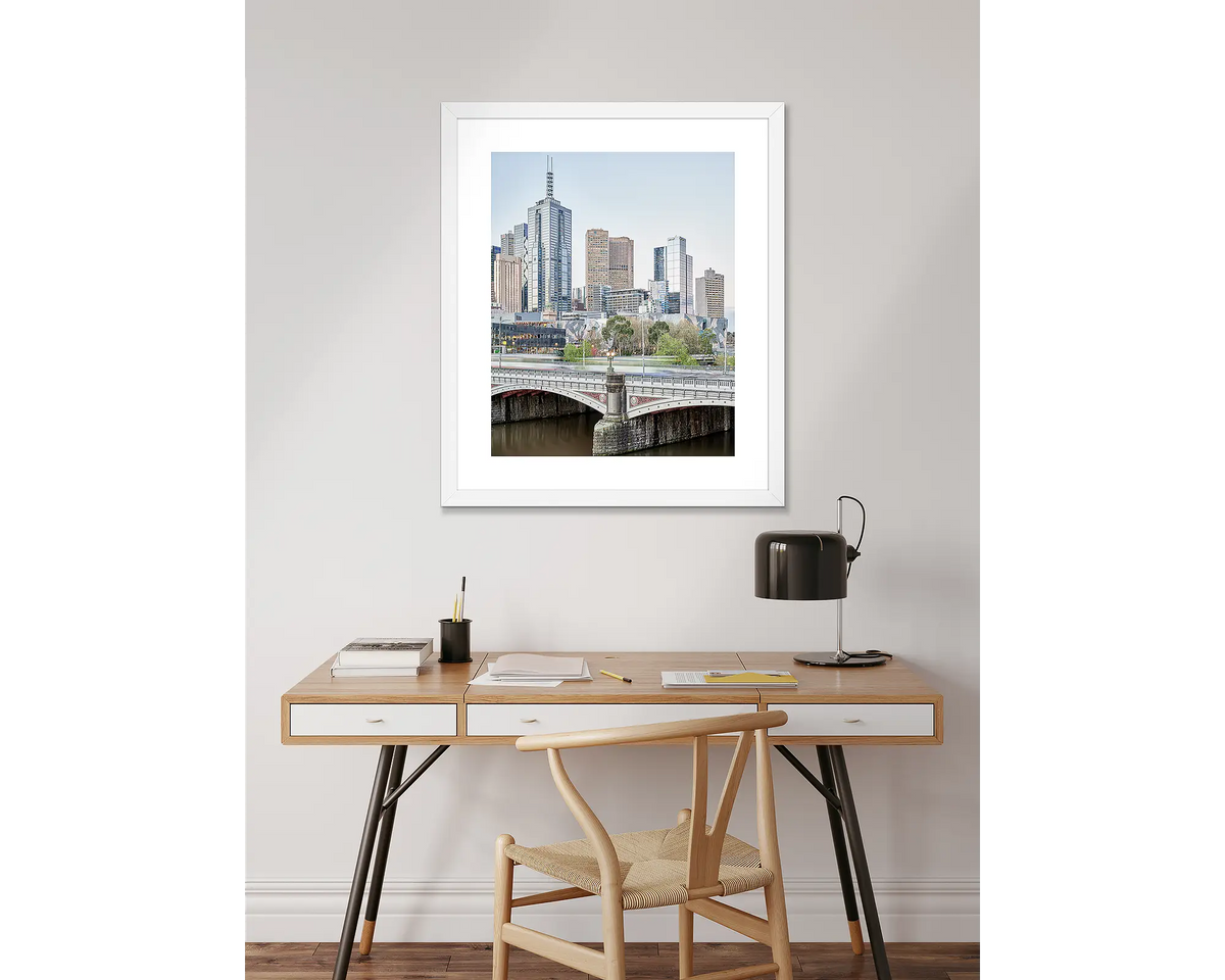 Top End. Melbourne artwork with a white frame, hanging above a desk.