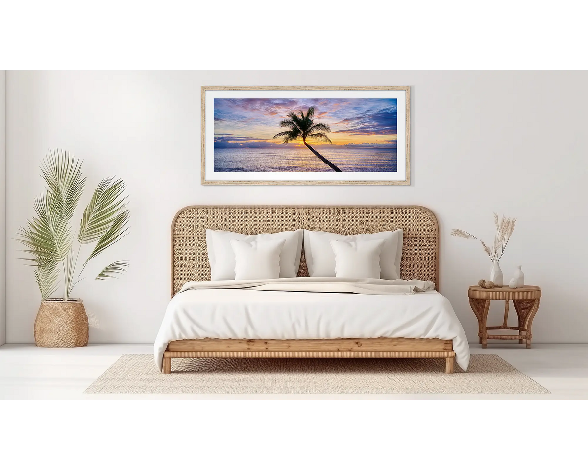 Tropical Icon. Cairns wall art, in an oak frame, in a bedroom. 