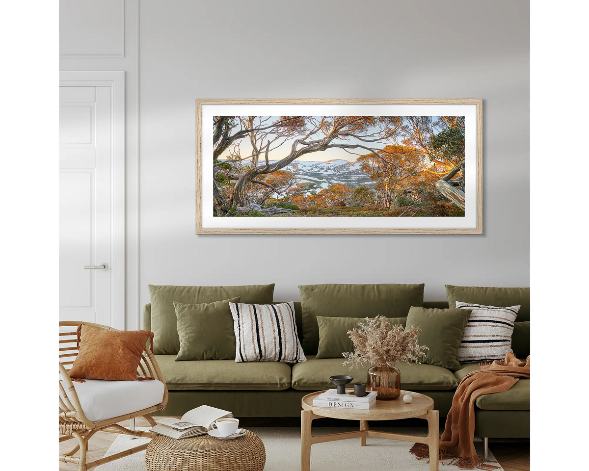 Twynam&#39;s View. Snowy Mountains wall art, hanging above a couch in a living room.