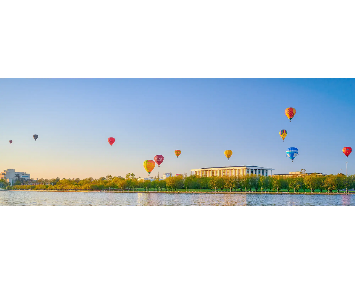 Upwards. Hot Air Balloons over National Library during balloon spectacular, Vivid Festival, Canberra