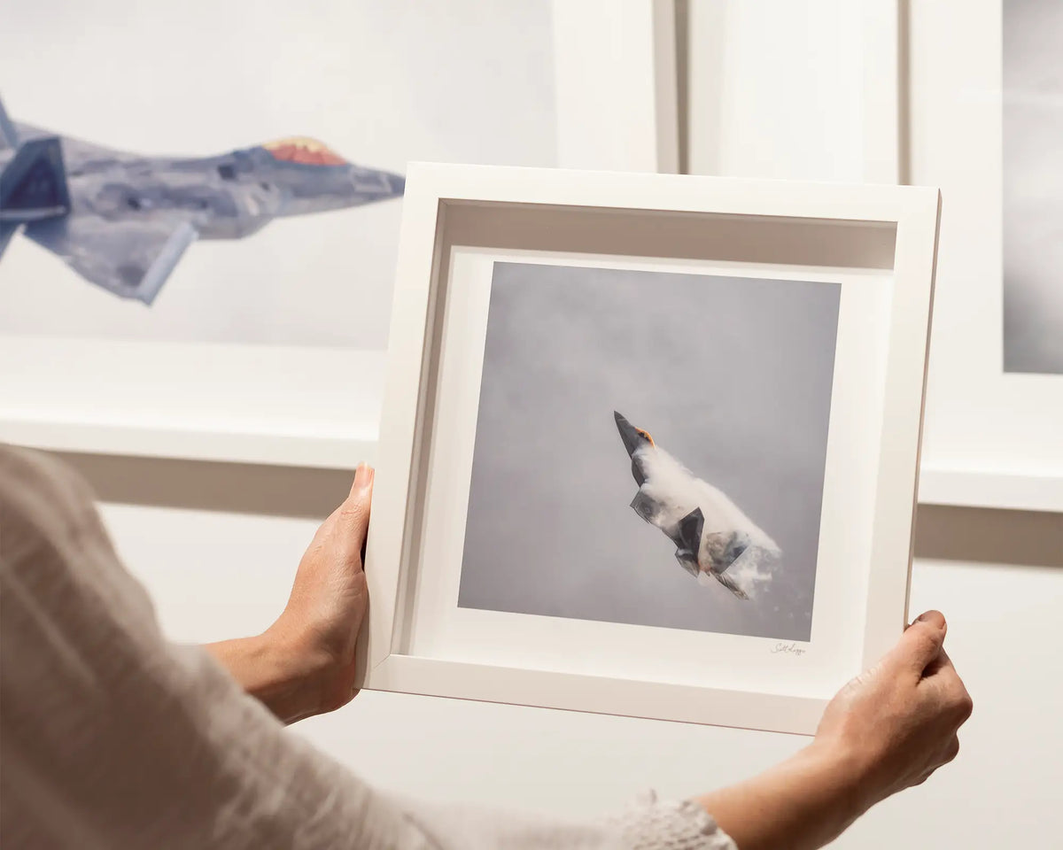 Vector. F-22 raptor fighter jet, small square framed print with a white frame.