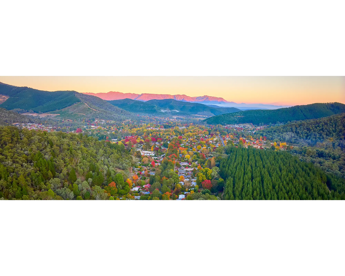 Welcome to Bright. Autumn sunrise over the town of Bright, Victoria.