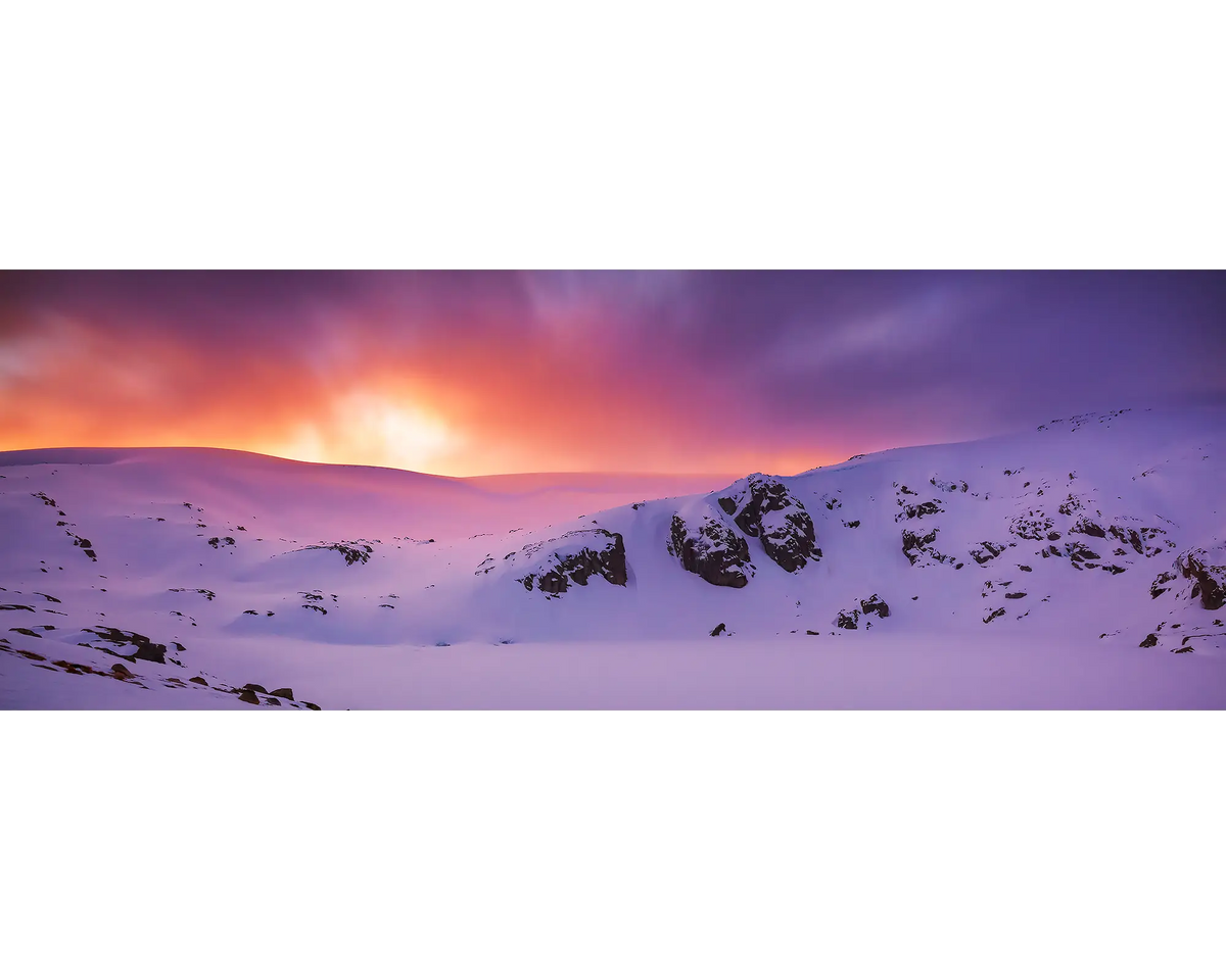 Colourful sunset over Blue Lake, Kosciuszko National Park, NSW. 