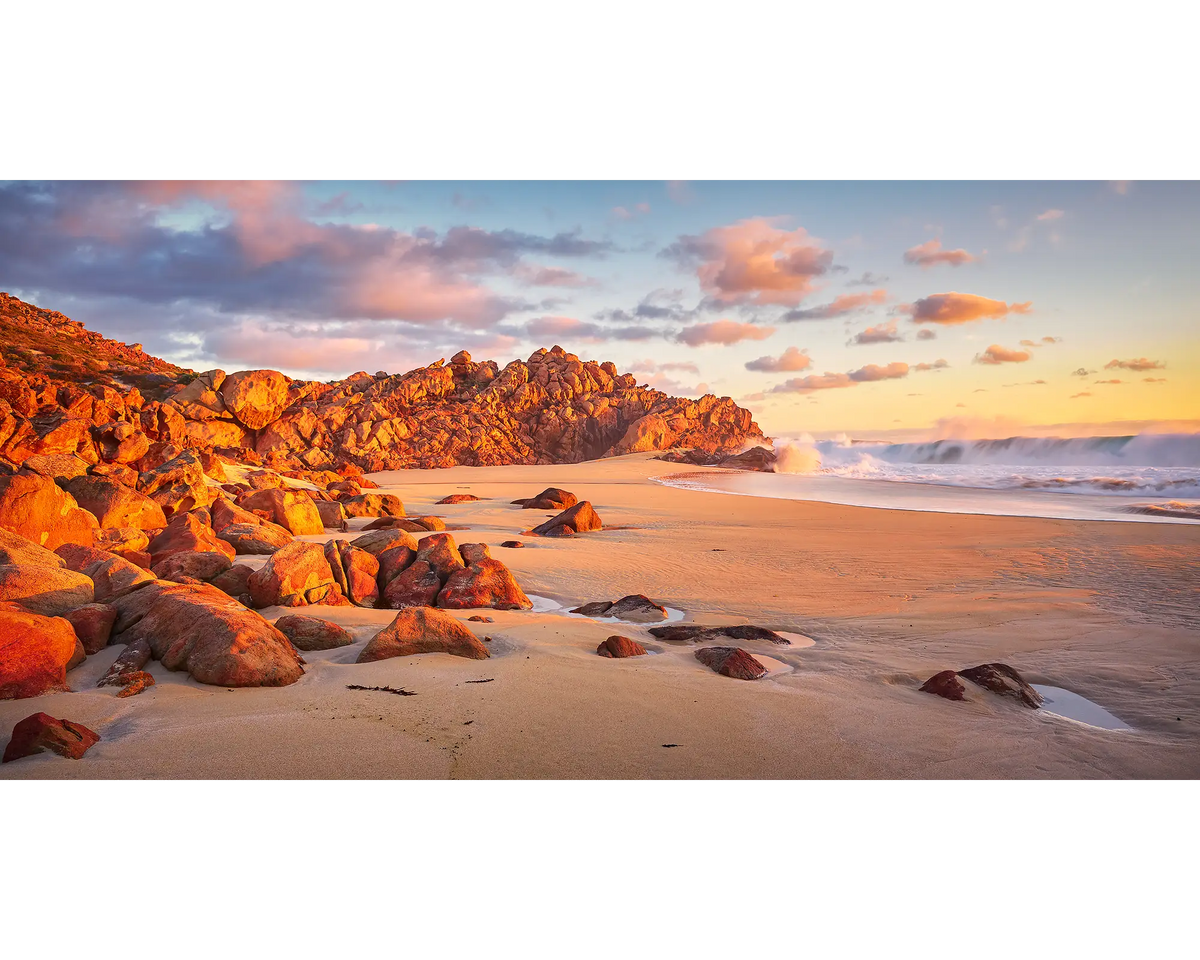 Waves rolling in at Wyadup Beach, bathed in sunset light, WA.